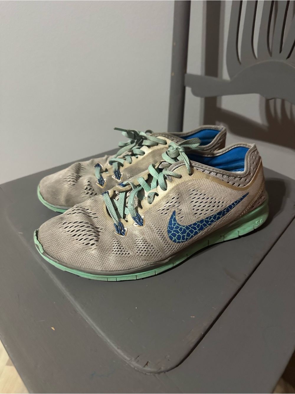 Nike Gray Sneakers with Mint Soles and Blue Swoosh